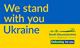 Flag of Ukraine with message saying: We stand with Ukraine