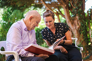 Photo of two people at a Shared Reading group